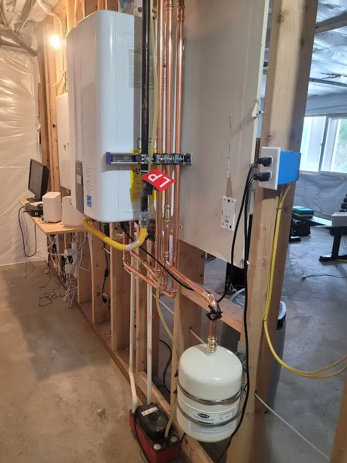 Licensed plumber repairing a kitchen sink in Auburndale